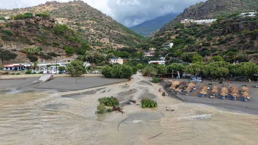 An aerial view of a flooded area near Ierapetra town, on the island of Crete, southern Greece, Saturday, Oct. 3, 2026, as severe weather causes flooding, road damage and widespread disruption across t ...
