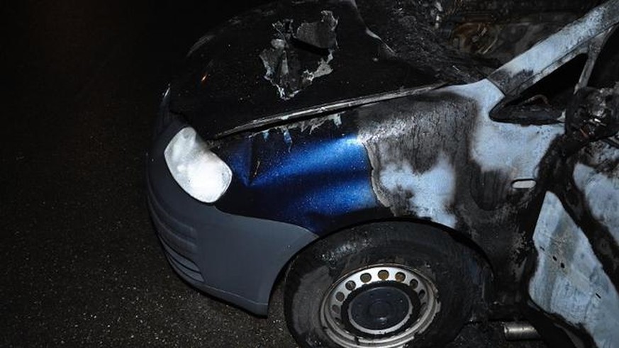 Das ausgebrannte Auto, in dem die kopflose Leiche gefunden wurde.<br data-editable="remove">