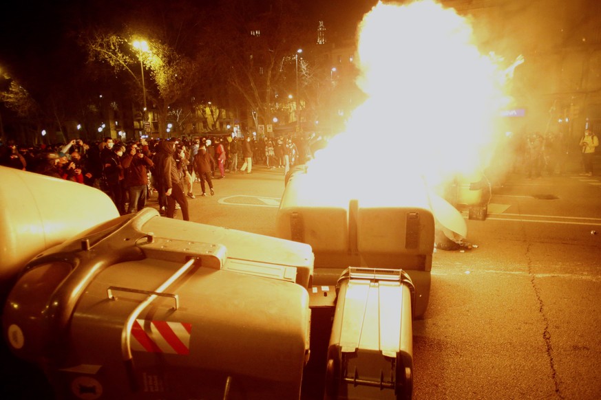 epa09024783 Protesters riot during a march in protest of imprisonment of Spanish rapper Pablo Hasel in central Barcelona, north eastern Spain, 19 February 2021. Riots happened in several Spanish citie ...