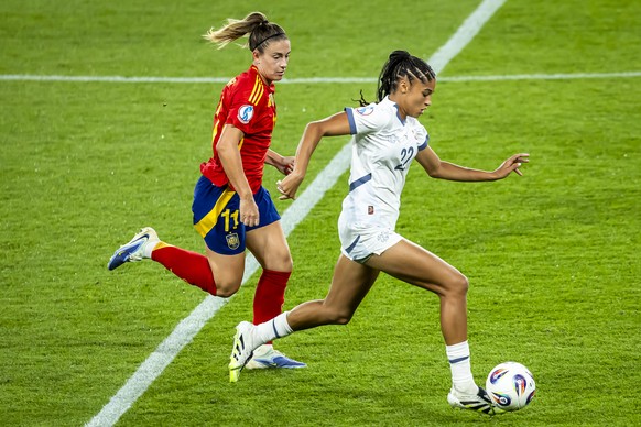 Switzerland's Sydney Schertenleib, right, fights for the ball with Spain's Alexia Putellas, left, during the UEFA Women's EURO 2025 quarterfinals soccer match between Spain and Switzerl ...