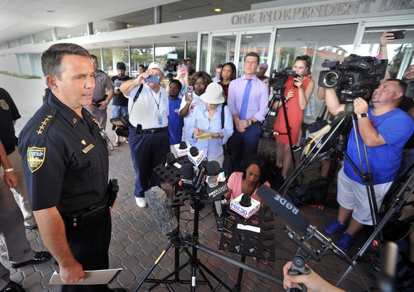 Jacksonville Sheriff Mike Williams addresses the media across the street from the scene of a multiple shooting at The Jacksonville Landing during a video game tournament, Sunday, Aug. 26, 2018, in Jac ...