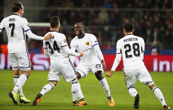 epa06274342 Taulant Xhaka (2-L) of Basel celebrates with his teammates after scoring the 1-0 lead during the UEFA Champions League group A soccer match between CSKA Moscow and FC Basel in Moscow, Russ ...