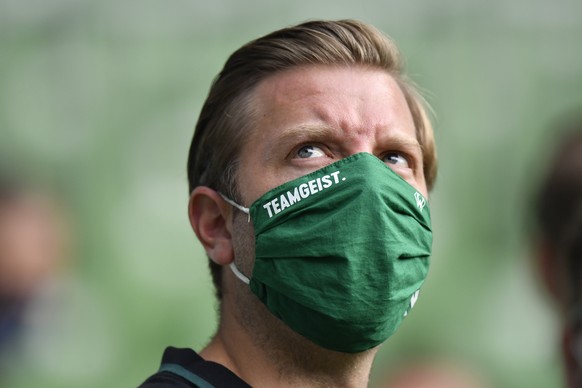 16.06.2020, Bremen: Fu�ball: Bundesliga, Werder Bremen - FC Bayern M�nchen, 32. Spieltag im Weserstadion. Bremens Trainer Florian Kohfeldt tr�gt eine Maske mit dem Schriftzug &quot;Teamgeist&quot;. Fo ...