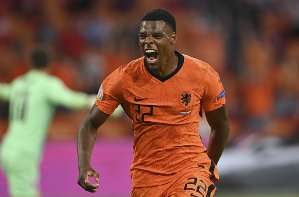 Denzel Dumfries of the Netherlands celebrates after scoring his side&#039;s second goal during the Euro 2020 soccer championship group C match between the The Netherlands and Austria at Johan Cruijff  ...