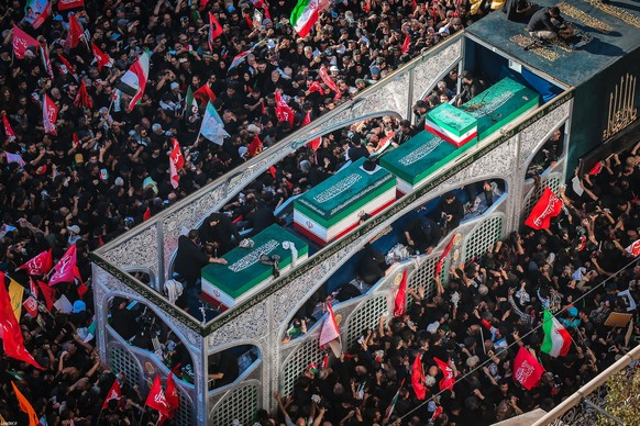 epa13100872 A handout photo made available by the Iranian Supreme Leader Office shows crowds taking part in the burial of late Iranian Supreme Leader Ayatollah Ali Khamenei in the city of Mashhad, Ira ...