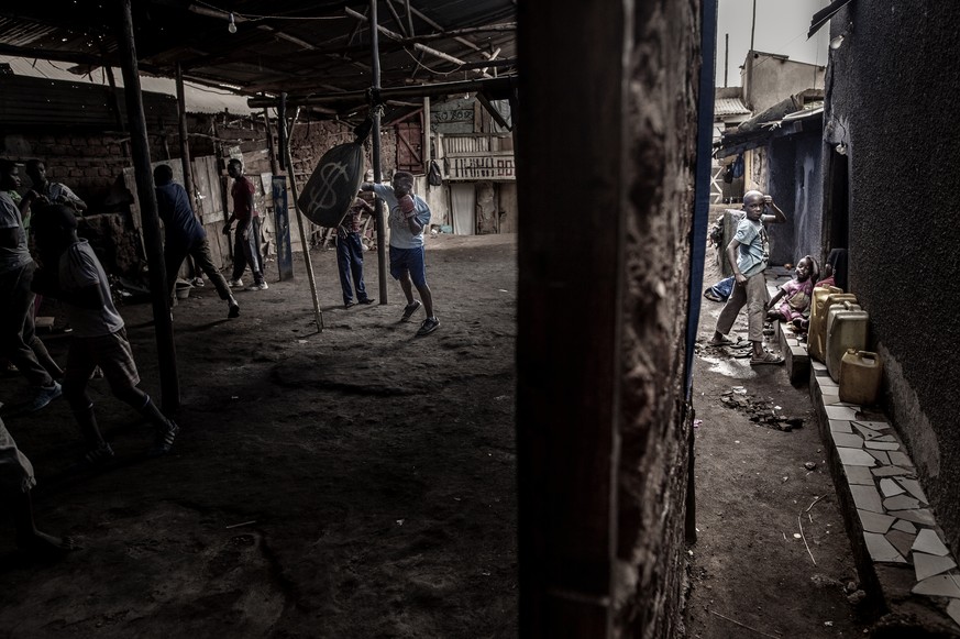 In this image released by the World Press Photo Foundation Thursday April 11, 2019, titled &quot;Boxing in Katanga&quot; by John T. Pedersen which was awarded first prize in the Sports, Singles, categ ...