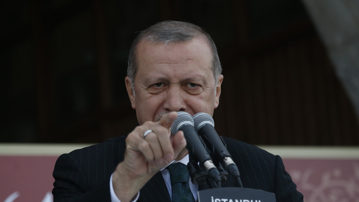 Turkey's President Recep Tayyip Erdogan makes a speech during the re-opening ceremony of the Spice Bazaar following restoration in Istanbul, Friday, May 4, 2018. Turkey holds presidential electio ...