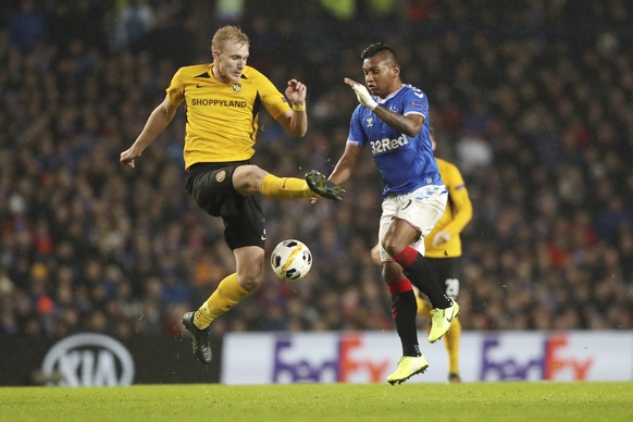 Rangers&#039; Alfredo Morelos, right, challenges for the ball with Young Boys&#039; Frederik Sorensen during the Europa League group G soccer match between Rangers and Young Boys at the Ibrox stadium  ...