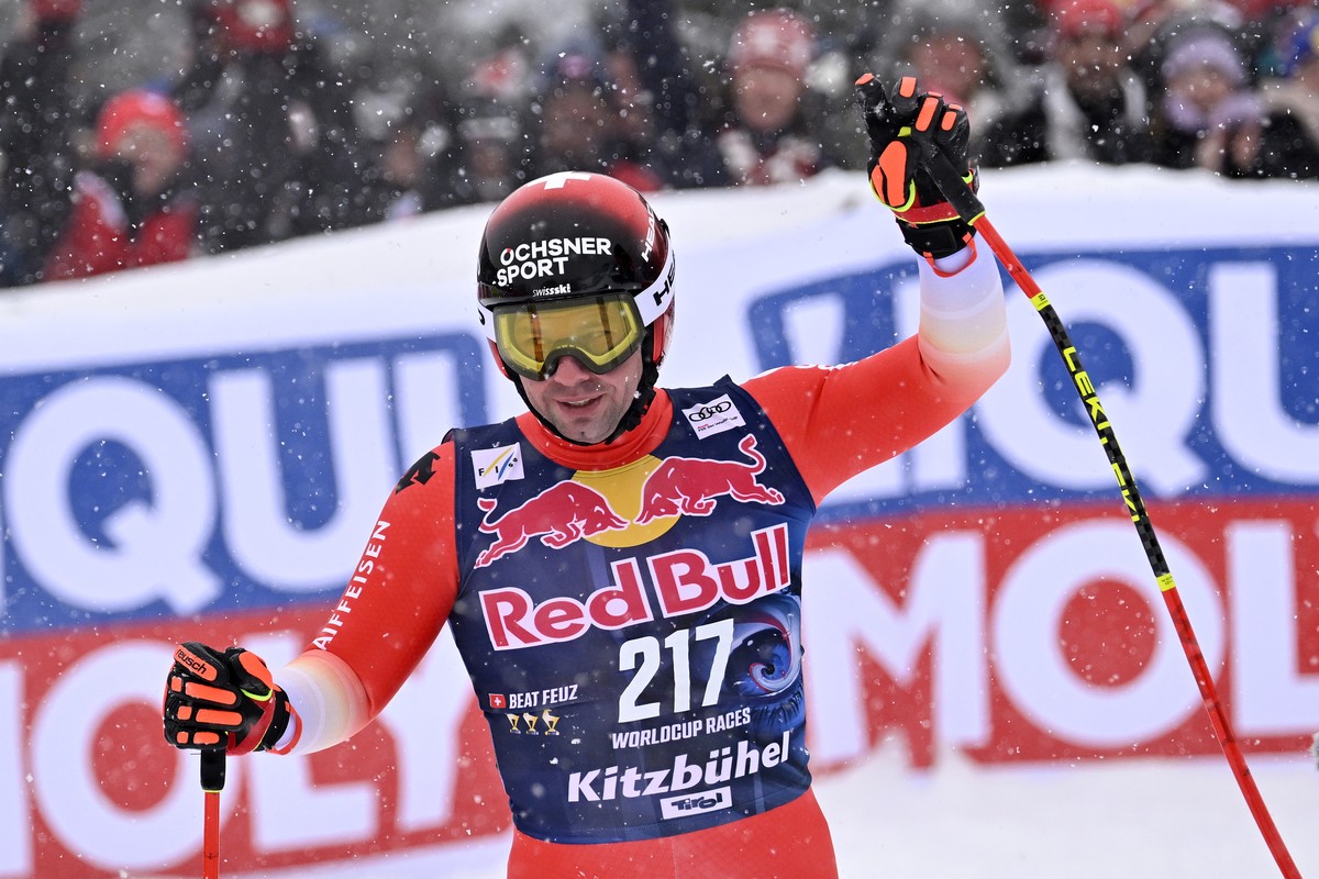 epa10420174 Beat Feuz of Switzerland reacts in the finish area during his farewell race, the Men's Downhill at the FIS Alpine Skiing World Cup at the Streif ski course in Kitzbuehel, Austria, 21  ...