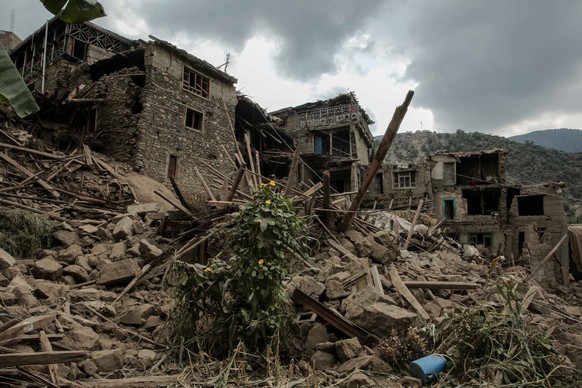 epa12350000 A view of the houses damaged in the earthquake in Kunar, Afghanistan, 03 September 2025. At least 1400 people have been killed and some 2,000 injured after a shallow magnitude-6.0 earthqua ...