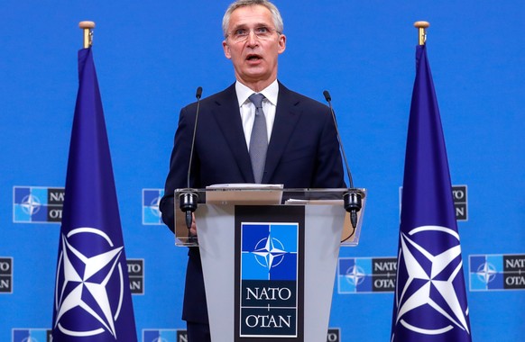 epa09706732 NATO Secretary General Jens Stoltenberg during a joint press conference at the end of a meeting at the NATO headquarters in Brussels, Belgium, 24 January 2022. The Finnish and Swedish fore ...