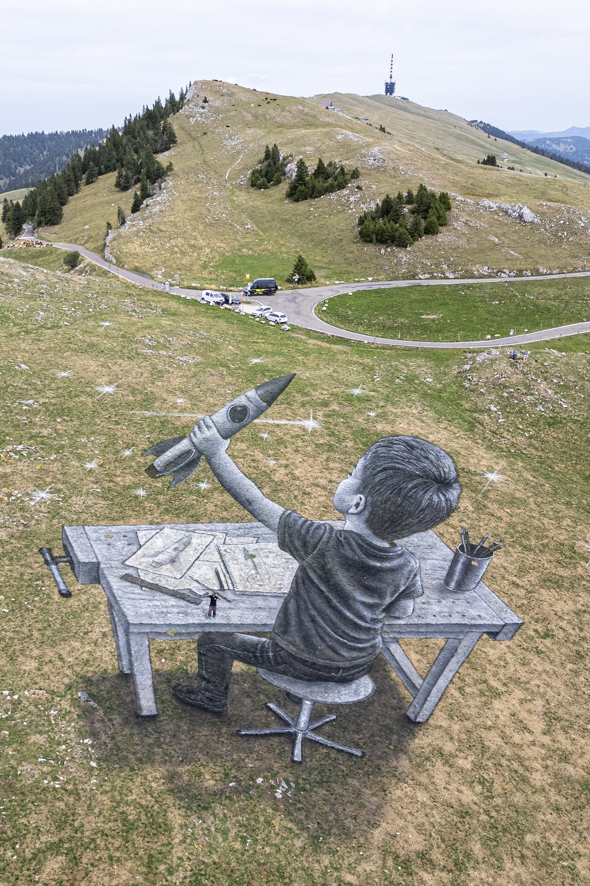 View of a new monumental mural in celebration of Zesar's 100th anniversary by artist Saype on Monday, September 7, 2026, on the Chasseral. Saype is a French-Swiss artist working in the fields of  ...