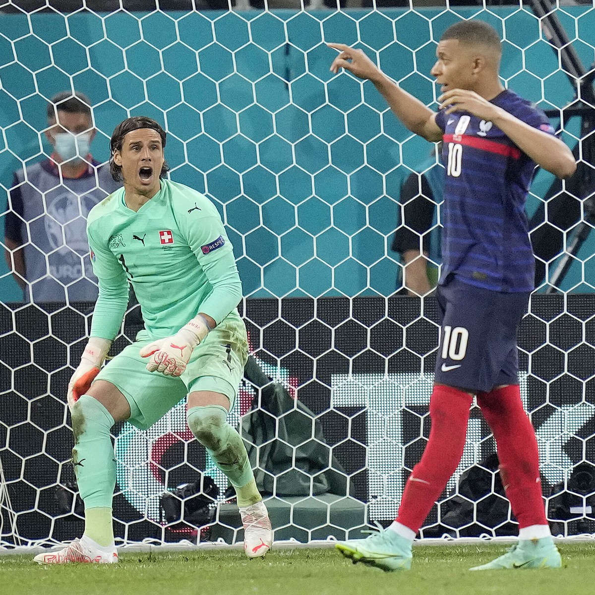 Switzerland's goalkeeper Yann Sommer reacts after France's Kylian Mbappe failed to score by penalty at the Euro 2020 soccer championship round of 16 match between France and Switzerland at t ...