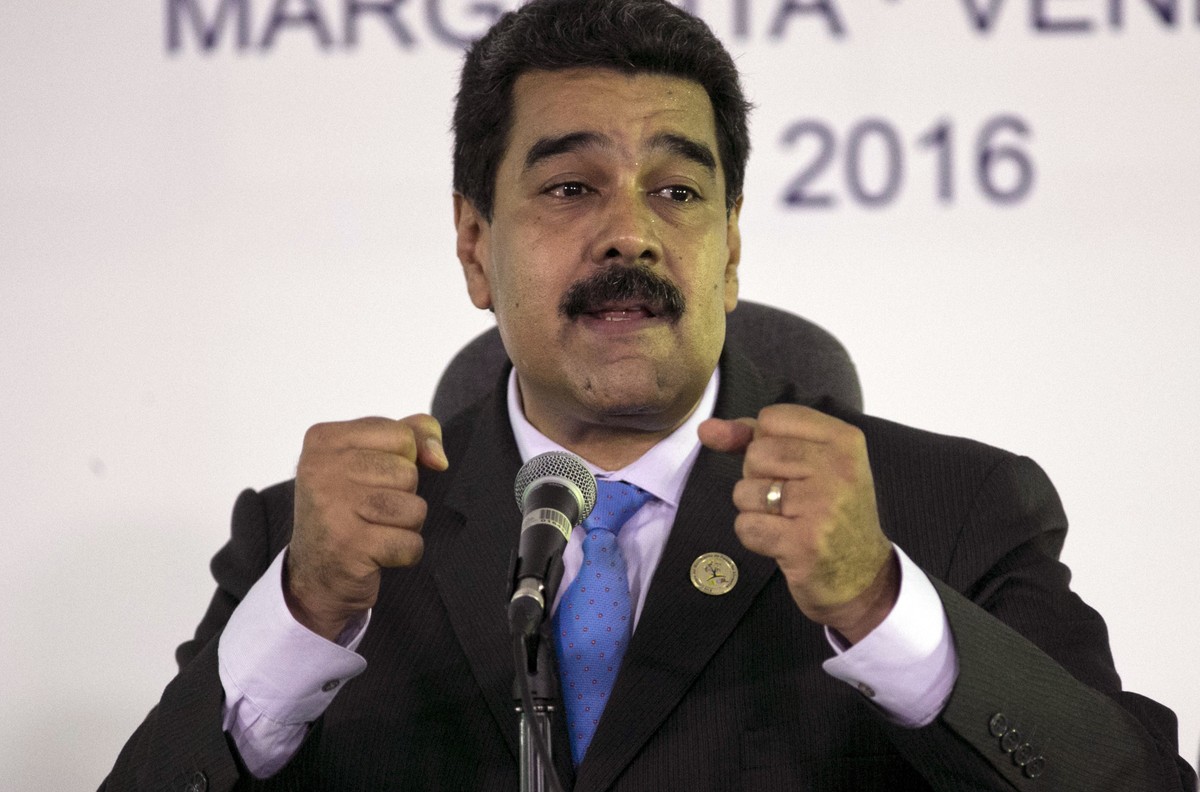 FILE - In this Sept 18, 2016, file photo, Venezuela's President Nicolas Maduro speaks during a press conference after closing ceremony of the 17th Non-Aligned Movement Summit in Porlamar, on Vene ...