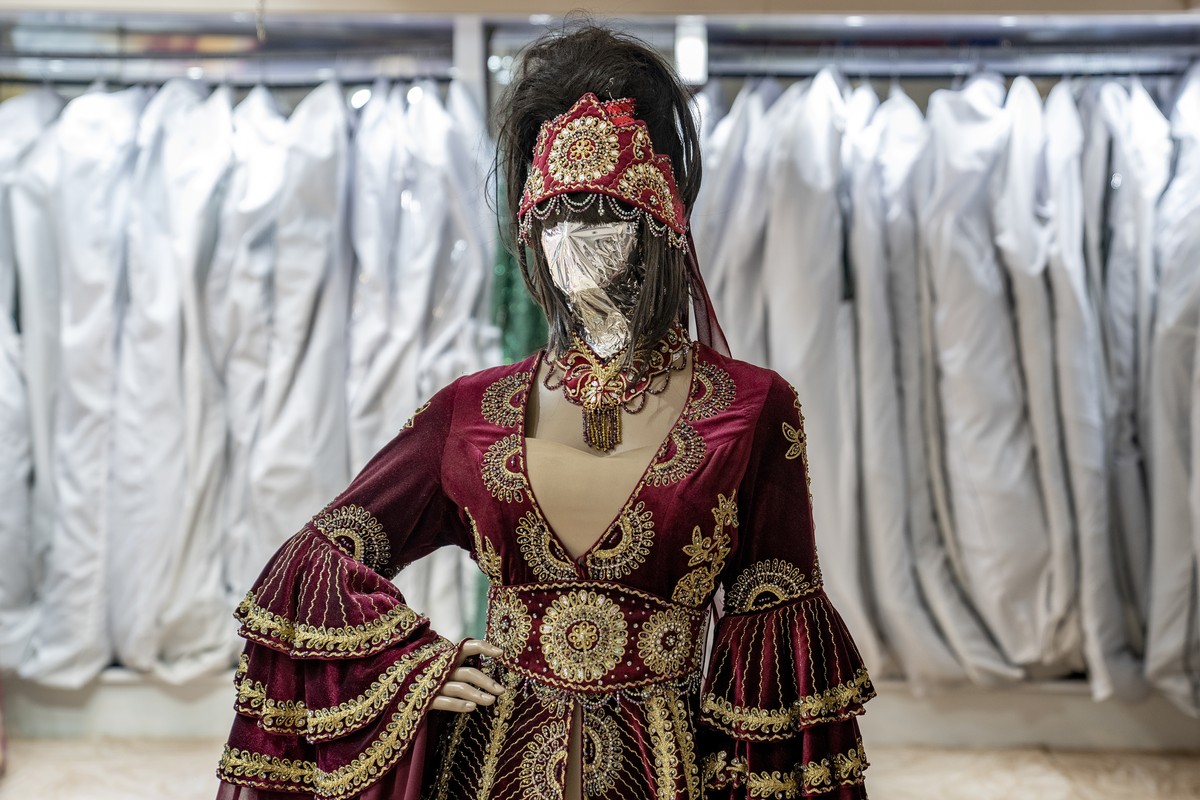 A mannequin's head is covered in a woman dress shop in Kabul, Afghanistan, Sunday, Dec. 25, 2022. Under the Taliban, the mannequins in women's dress shops across the Afghan capital Kabul are ...
