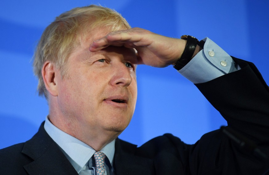 epaselect epa07643231 Boris Johnson gestures as he takes questions during the launch of his bid to become the leader of the Conservative Party in London, Britain, 12 June 2019. Conservative members of ...