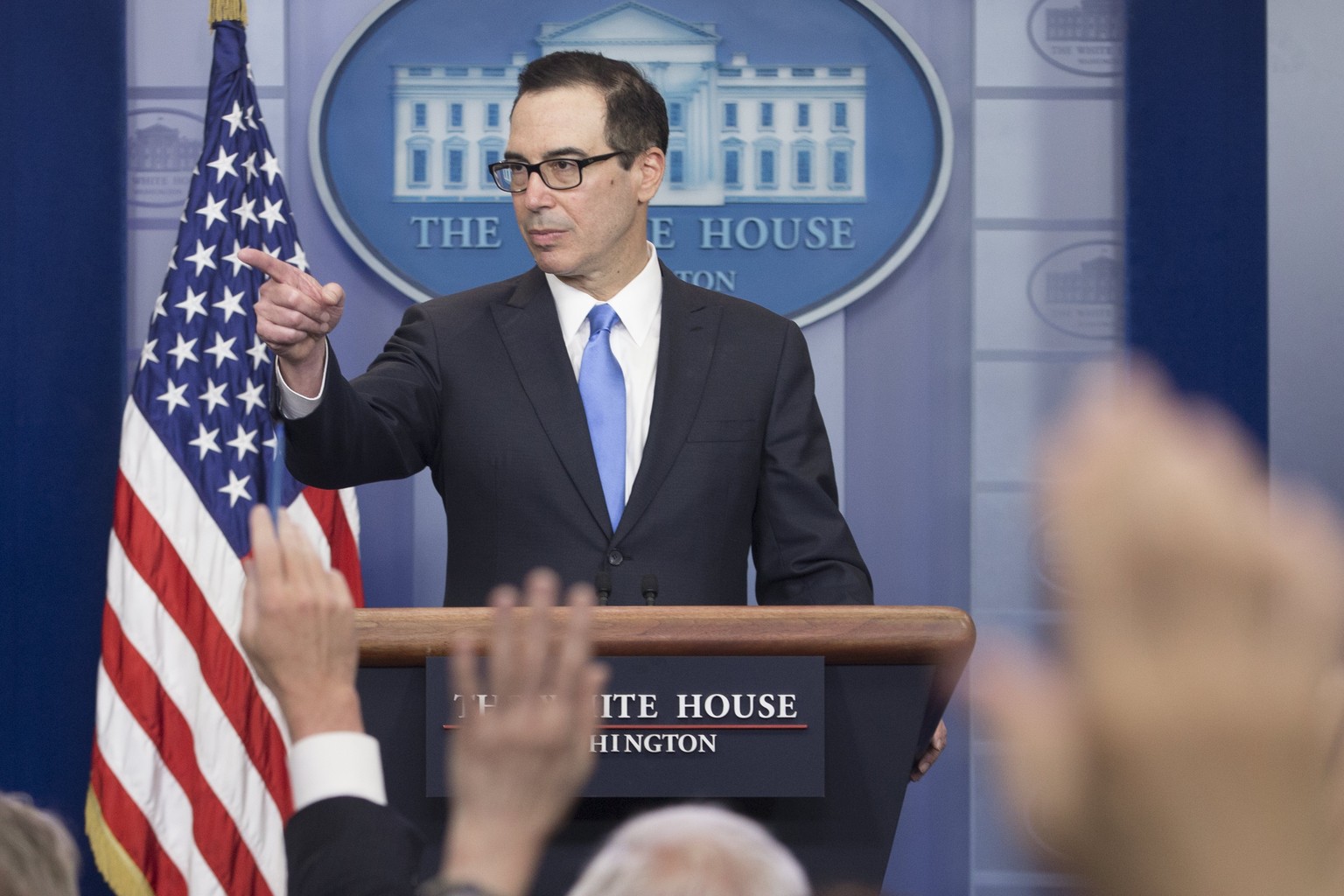 epa05925737 US Treasury Secretary Steven Mnuchin (R) participates in a news conference in the James Brady Press Briefing Room at the White House in Washington, DC, USA, 24 April 2017. The US Treasury  ...