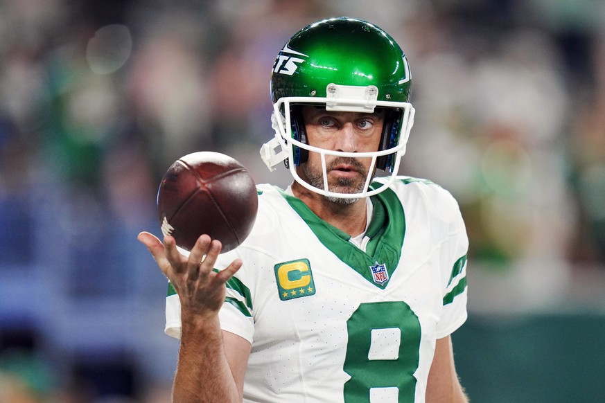 FILE - New York Jets quarterback Aaron Rodgers (8) warms up before an NFL football game against the Buffalo Bills on Monday, Sept. 11, 2023, in East Rutherford, N.J. The Jets quarterback enters this s ...