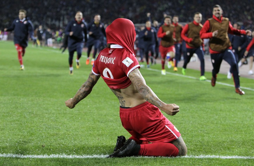 epa06255323 Aleksandar Prijovic of Serbia celebrates scoring during the FIFA World Cup 2018 Group D qualifying soccer match between Serbia and Georgia in Belgrade, Serbia, 09 October 2017. EPA/ANDREJ  ...