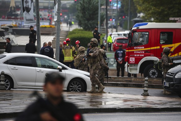 Turkish security forces cordon off an area after an explosion in Ankara, Sunday, Oct. 1, 2023. A suicide bomber detonated an explosive device in the heart of the Turkish capital, Ankara, on Sunday, ho ...