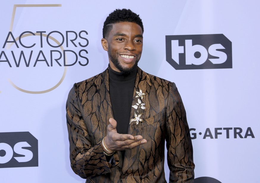 FILE - In this Jan. 27, 2019 file photo, Chadwick Boseman arrives at the 25th annual Screen Actors Guild Awards at the Shrine Auditorium &amp; Expo Hall in Los Angeles. Boseman, who played Black icons ...