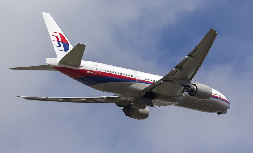 Melbourne, Australia - December 11, 2014: Malaysia Airlines Boeing 777 airliner departing Melbourne International Airport.