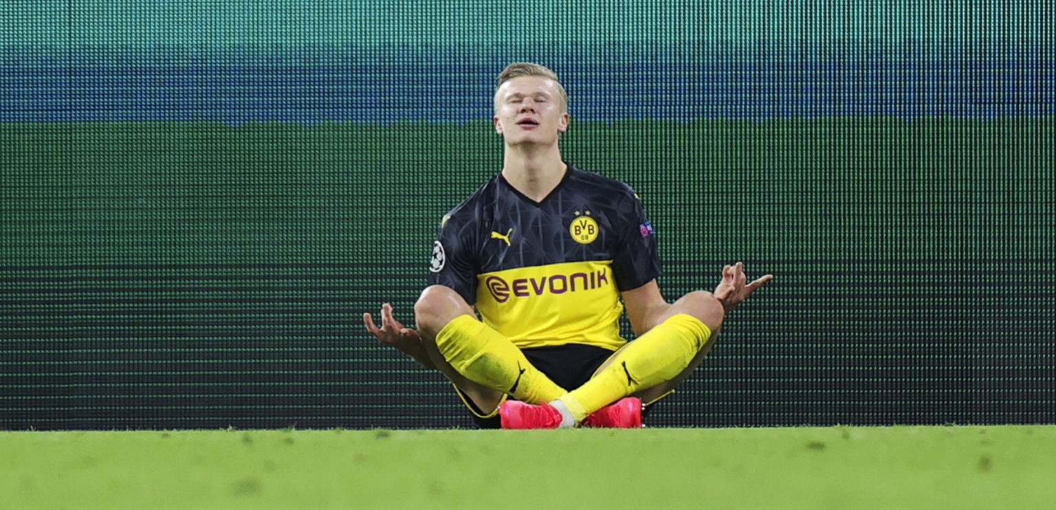 epa08226799 Dortmund&#039;s Erling Braut Haaland (C) celebrates scoring opening goal during the UEFA Champions League round of 16 first leg soccer match between Borussia Dortmund and Paris Saint-Germa ...