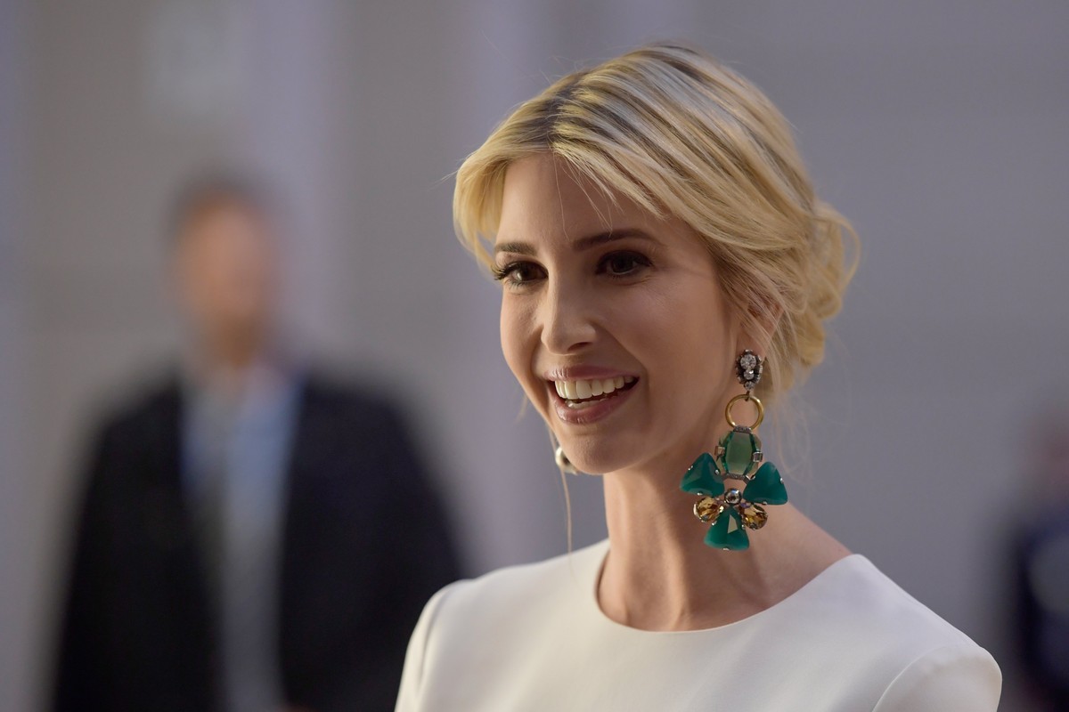 epa05927560 US President Trump's assistant and daughter Ivanka Trump wearing large earrings arrives at a Gala Dinner at Deutsche Bank within the framework of the W20 summit in Berlin, Germany, 25 ...