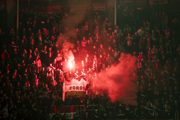 Fans of Hungary react during the 2018 Fifa World Cup Russia group B qualification soccer match between Switzerland and Hungary in the St. Jakob-Park stadium in Basel, Switzerland, on Saturday, October ...