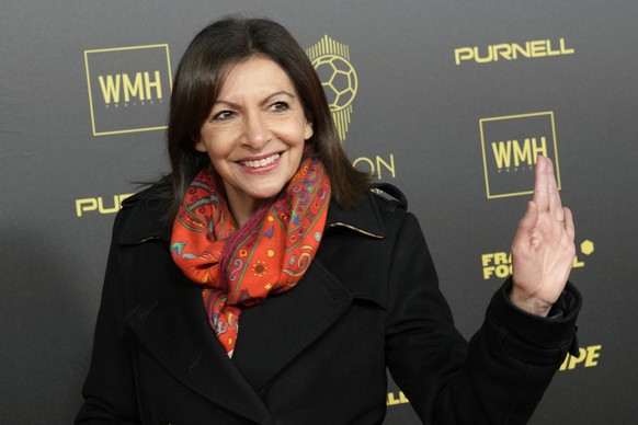 Paris mayor Anne Hidalgo arrives arrive for the Golden Ball award ceremony at the Theatre du Chatelet, in Paris, Monday, Nov. 29, 2021. (AP Photo/Christophe Ena)