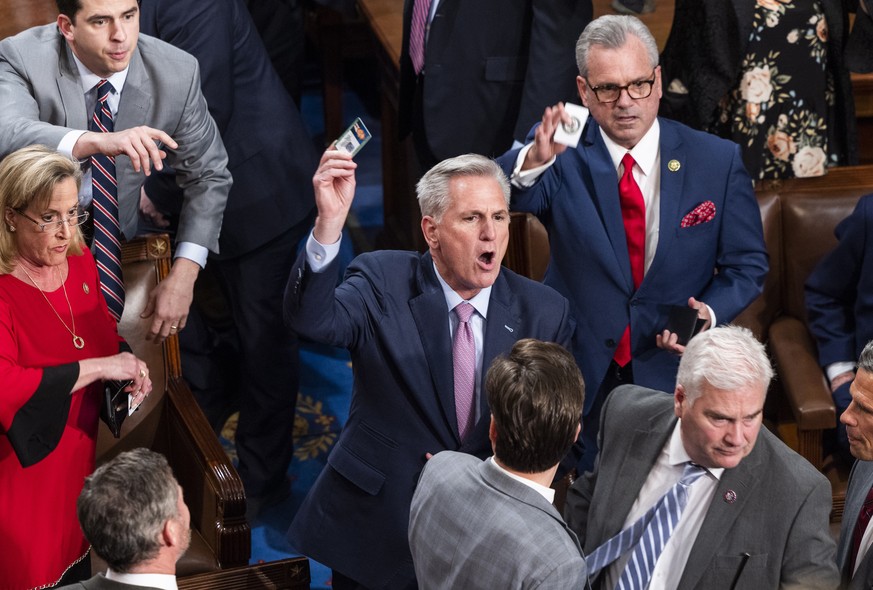 epa10393446 Republican Leader Kevin McCarthy screams to stop an adjournment vote, believing he now has the votes to be speaker of the House of Representatives in the US Capitol in Washington, DC, USA  ...