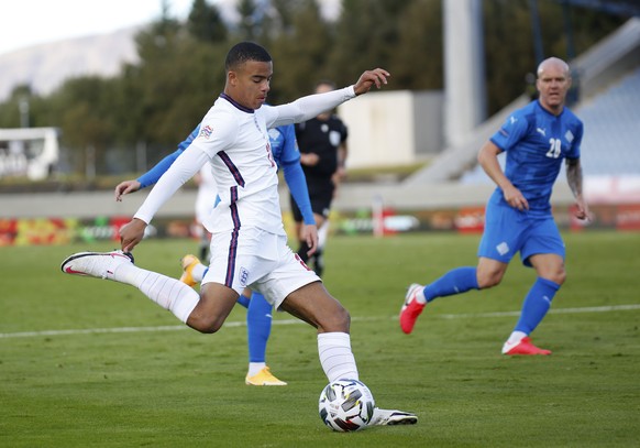 England&#039;s Mason Greenwood takes a shot during the UEFA Nations League soccer match between Iceland and England in Reykjavik, Iceland, Saturday, Sept. 5, 2020. England players Phil Foden and Mason ...