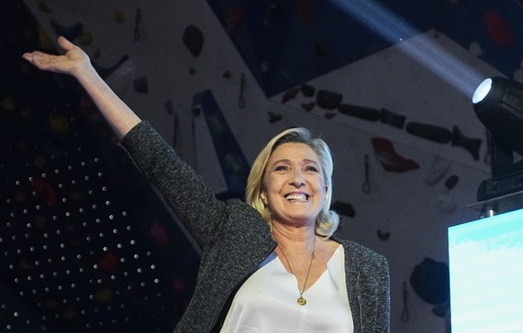Leader of the French far right National Rally Marine Le Pen takes part during a meeting for the upcoming European elections in Henin-Beaumont, northern France, Friday, May 24, 2024. (AP Photo/Michel E ...