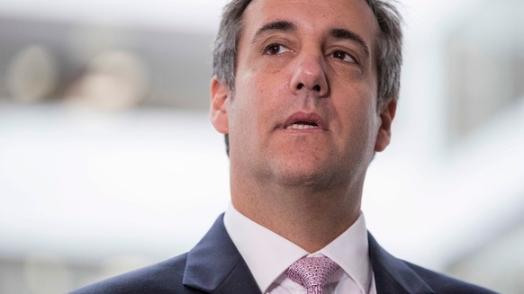 FILE - In this Sept. 19, 2017 file photo, President Donald Trump&#039;s personal attorney Michael Cohen appears in front of members of the media after a closed door meeting with the Senate Intelligenc ...