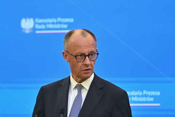 epa12081391 Germany&#039;s newly elected Chancellor Friedrich Merz attends a joint press conference with Polish Prime Minister Donald Tusk (not pictured) following their meeting at the prime minister& ...