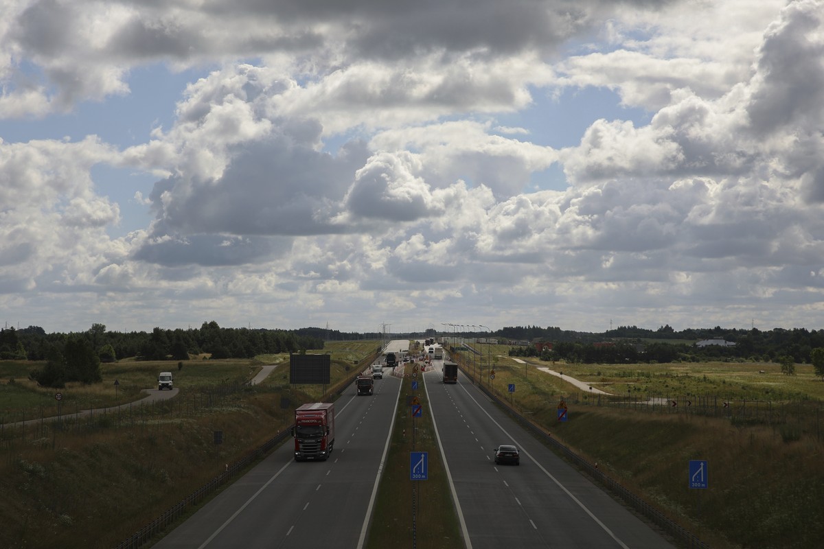 Cars drive on express road in Suwalki, Poland, Thursday, July 7, 2022. The Suwalki gap, which stretches about 100 kilometres along the Lithuanian-Polish border and lies sandwiched between Belarus and  ...