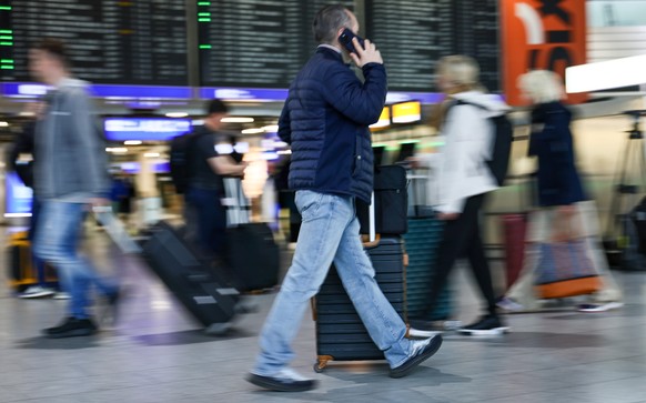 epa12886762 Luggage of waiting passengers in Terminal 1 during a strike at Frankfurt Airport in Frankfurt am Main, Germany, 13 April 2026. The union German Cockpit Association, Inc. has called on its  ...