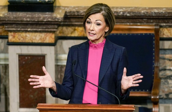 FILE - Iowa Gov. Kim Reynolds delivers her Condition of the State address before a joint session of the Iowa Legislature, on Jan. 11, 2022, at the Statehouse in Des Moines, Iowa. Reynolds is introduci ...