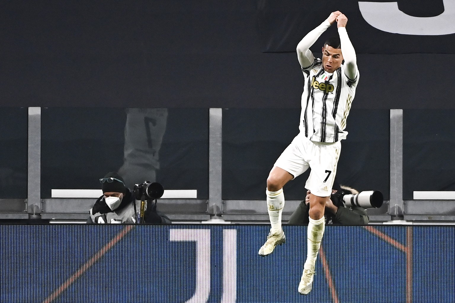 Cristiano Ronaldo of Juventus celebrates after scoring 3-0 during the Italian Serie A soccer match between Juventus and Udinese at the Allianz Stadium in Turin, Italy, Sunday Jan. 3, 2021. (Marco Alpo ...