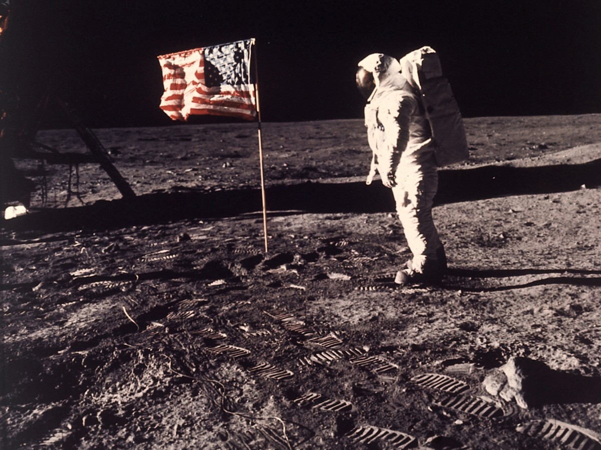 FILE - A July 20, 1969 photo from files made showing astronaut Edwin E. "Buzz" Aldrin Jr. posing for a photograph beside the U.S. flag deployed on the moon during the Apollo 11 mission. A pr ...
