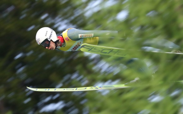 epa07730055 Aleksander Zniszczol from Poland is airborne during the Men&#039;s Team competition at the FIS summer ski jumping Grand Prix in Wisla, Poland, 20 July 2019. EPA/GRZEGORZ MOMOT POLAND OUT