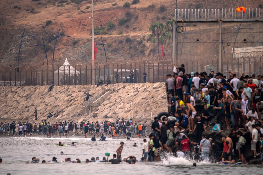 Migrants return to Morocco from the Spanish enclave of Ceuta, Friday, July 31, 2026. (AP Photo/Antonio Sempere)
Spain Ceuta