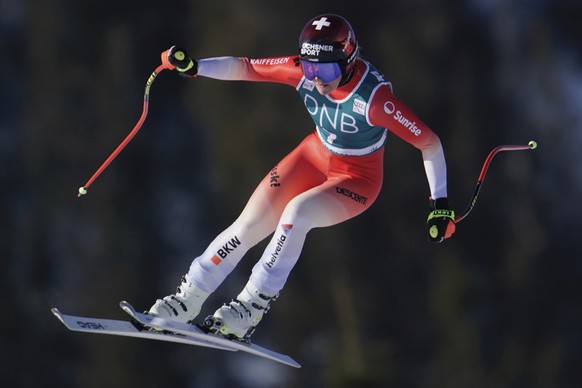 Switzerland&#039;s Corinne Suter speeds down the course during an alpine ski, World Cup women&#039;s downhill race, in Kvitfjell, Norway, Saturday, March 4, 2023. (Stian Lysberg Solum/NTB Scanpix via  ...