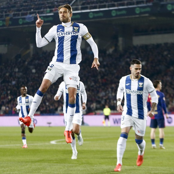 epa11779673 Leganes&#039; Sergio Gonzalez celebrates scoring the opening goal during the LaLiga EA Sports soccer match between FC Barcelona and Leganes at Lluis Companys stadium in Barcelona, Cataloni ...