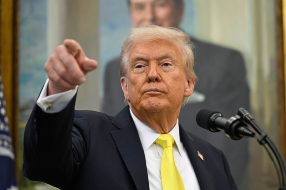 President Donald Trump speaks during an event in the Oval Office at the White House, Wednesday, Oct. 15, 2025, in Washington. (AP Photo/John McDonnell)
Trump