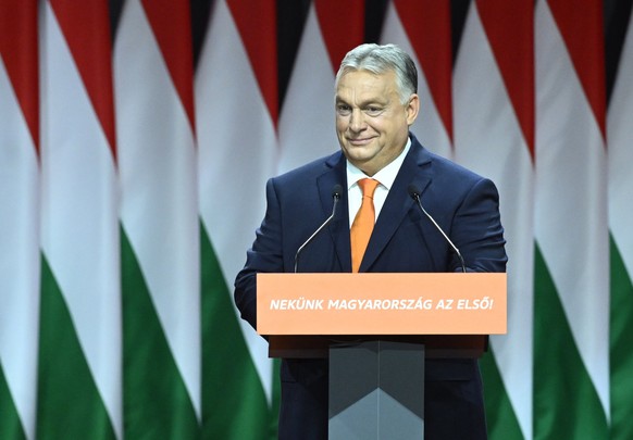 epa10983031 Hungarian Prime Minister Viktor Orban delivers his speech after he was re-elected as party president at the election of officials congress of the ruling Hungarian Fidesz party, during the  ...