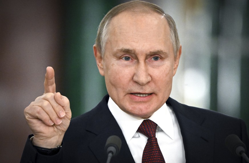 FILE - Russian President Vladimir Putin gestures while speaking at a news conference following a meeting of the State Council at the Kremlin in Moscow, Russia on Dec. 22, 2022. Russia&#039;s economy h ...