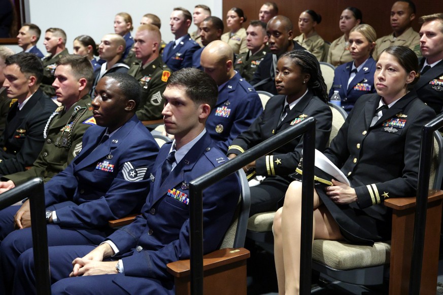 Members of the military listen as Secretary of Defense Pete Hegseth gives a State of the Force address at Marine Corps Base Quantico, Wednesday, Sept. 30, 2026 in Quantico, Va. (Alex Wong/Pool Photo v ...