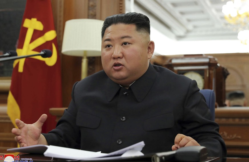 In this photo provided Sunday, Dec. 22, 2019, by the North Korean government, North Korean leader Kim Jong Un speaks during a ruling party meeting, North Korea. North Korea said Sunday Kim has convene ...