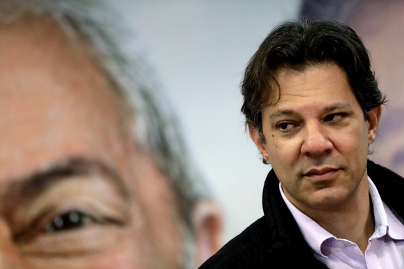 epa06933273 Formula member of the candidacy of Luiz Inacio Lula da Silva, Fernando Haddad, attends a press meeting in Sao Paulo, Brazil, on 7 August 2018. Formula members in the presidential candidacy ...